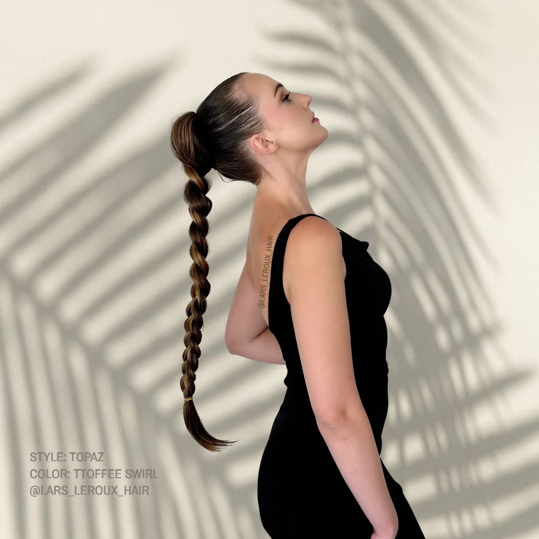 Demonstration of the length of the Topaz french braid ponytail from Lars Leroux Hair